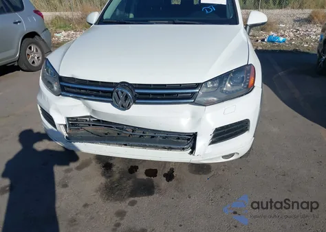 2014 Volkswagen Touareg Tdi Lux z USA, uszkodzony, nr VIN WVGEP9BPXED012958